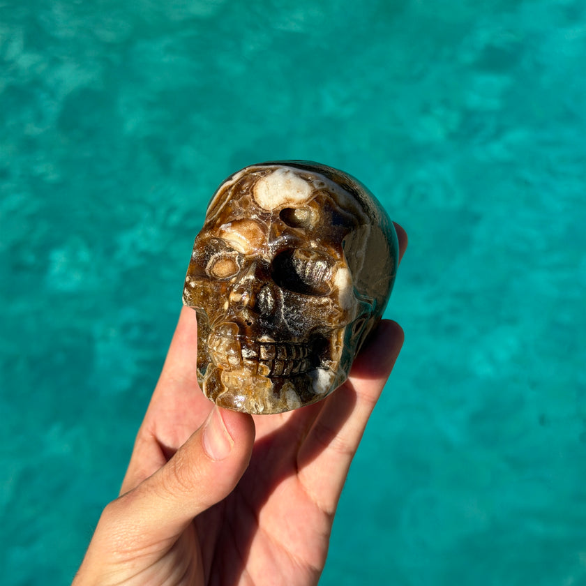 Brown Aragonite Skull Carving